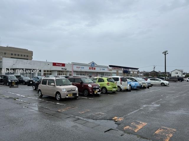 ショッピングセンター　新津程島ショッピングセンター（ショッピングセンター）まで929m