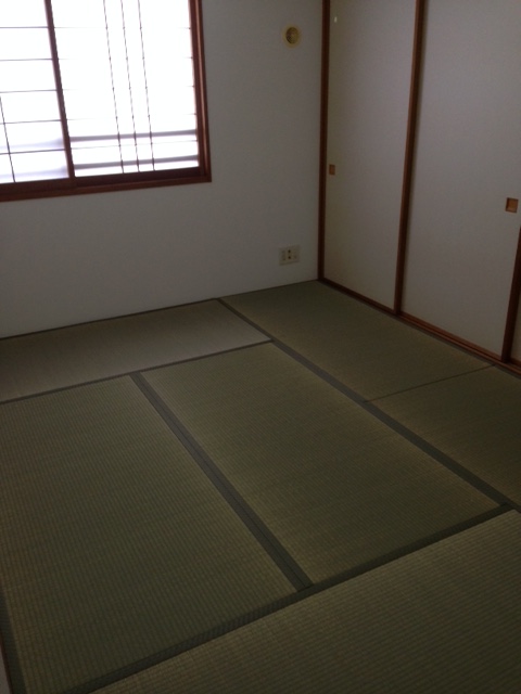 野村ステイツ八乙女グランシエルの居間写真