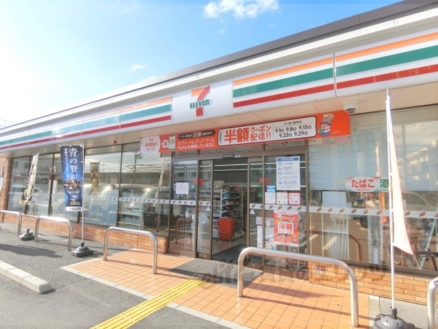 コンビニ　セブンイレブン枚方伊加賀本町店（コンビニ）まで750m