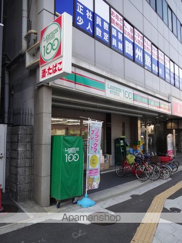 コンビニ　ローソンストア１００（コンビニ）まで992m