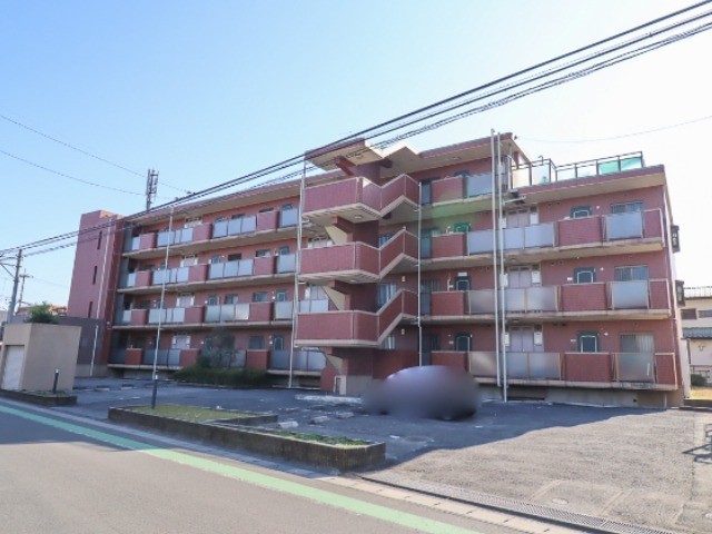 小山市大字小山のマンションの建物外観