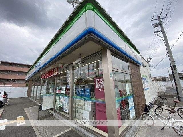 コンビニ　ファミリーマート（コンビニ）まで989m