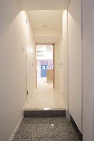 玄関　AXAS駒込ASYLCOURT　北区西ヶ原1