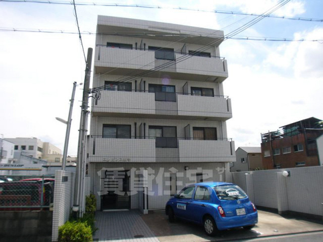 京都市南区西九条豊田町のマンションの建物外観