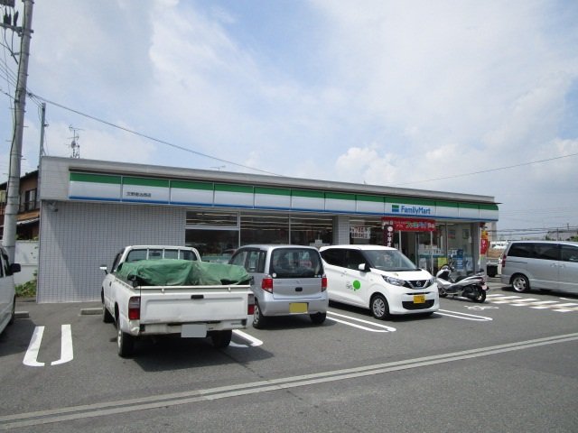コンビニ　ファミリーマート　交野倉治西店（コンビニ）まで310m