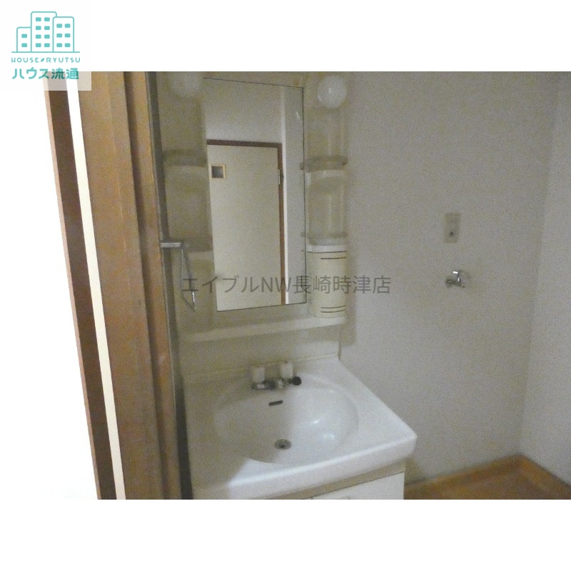 洗面設備　※別号室の写真です