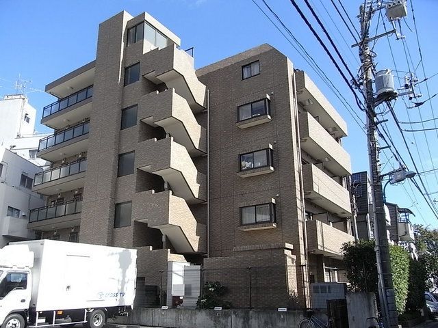 建物外観　外観タイル張りの分譲賃貸マンション