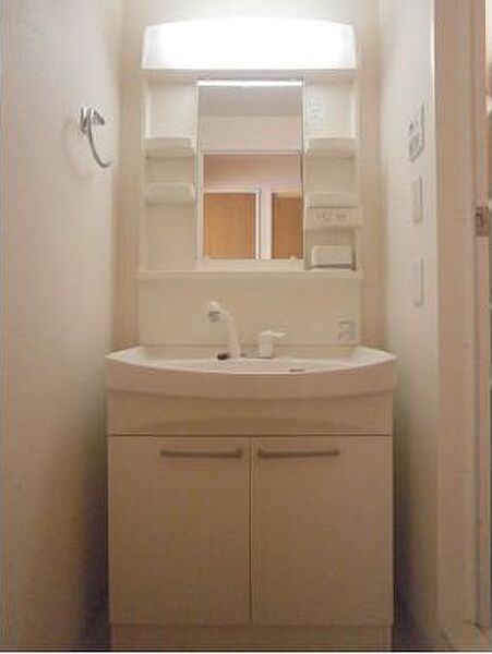 洗面設備　※別部屋の参考写真です。