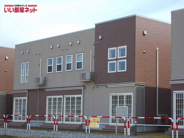 妙高市柳井田町のアパートの建物外観