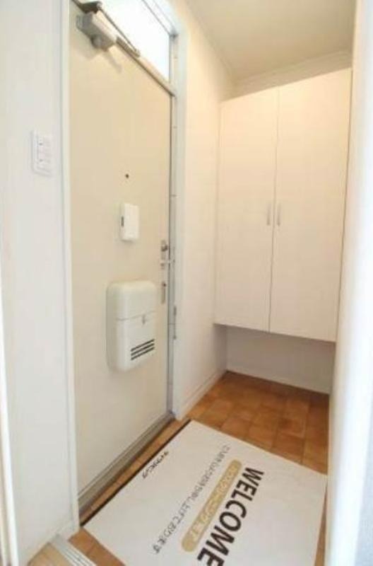 プレジール白楽 B棟の玄関写真