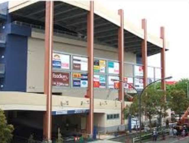 ショッピングセンター　クロスガーデン多摩（ショッピングセンター）まで1025m