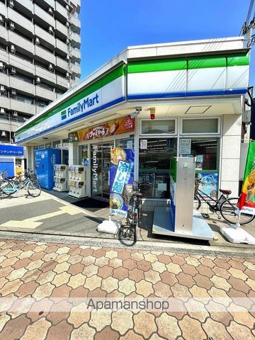 コンビニ　ファミリーマート関目高殿駅西店（コンビニ）まで440m