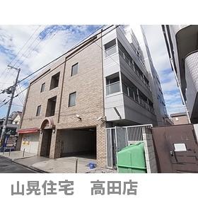 【大和高田市西三倉堂のマンションの建物外観】