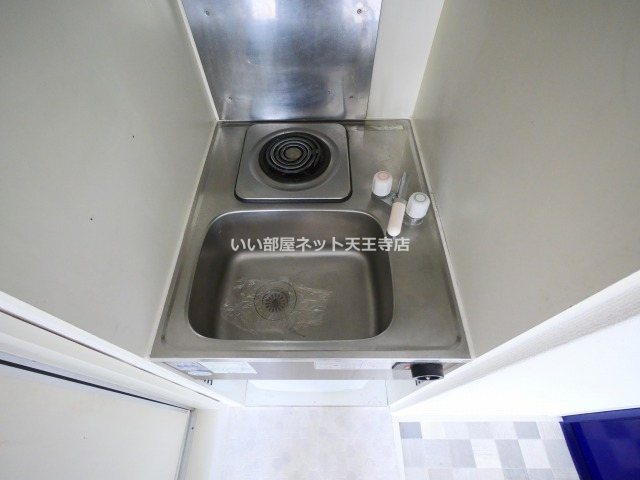 ホワイトインのキッチン写真