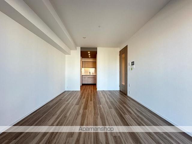 HARUMI FLAG SUN VILLAGE D棟の居間写真