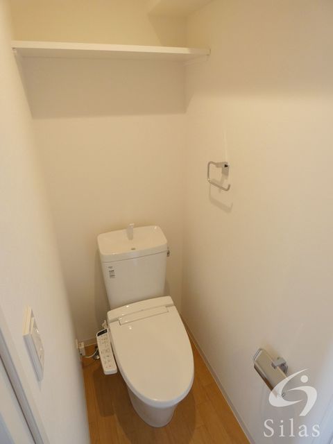 地下鉄四つ橋線 住之江公園駅 徒歩6分 5階建 築8年のトイレ写真
