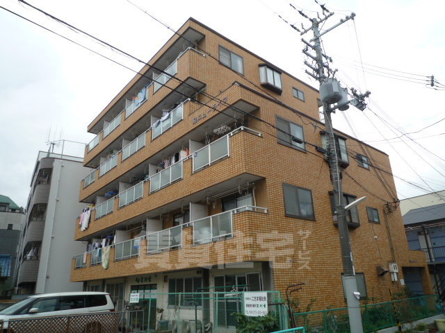 堺市北区東浅香山町のマンションの建物外観
