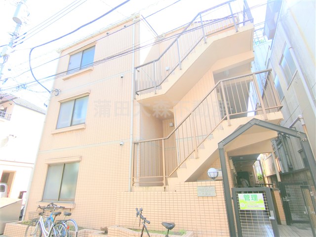 建物外観　1990年4月築　鉄骨造地上3階建て総戸数15戸の賃貸マンシ