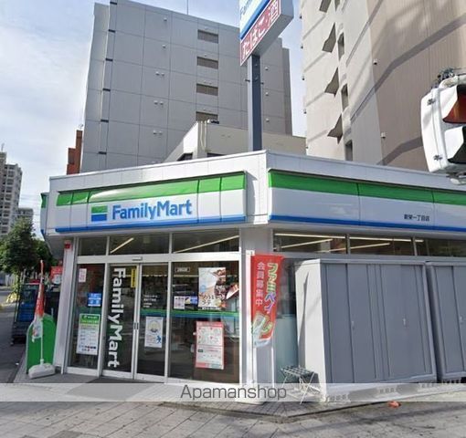 コンビニ　ファミリーマート（コンビニ）まで309m