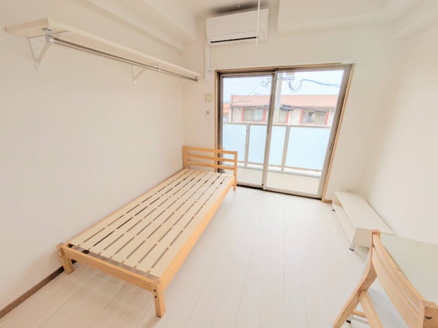 学生会館 レジディア九産大前の居間写真