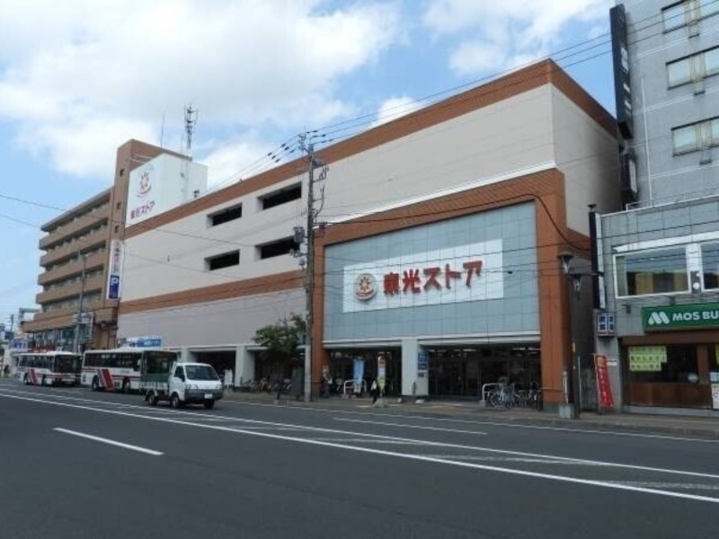 スーパー　東光ストア麻生店（スーパー）まで688m