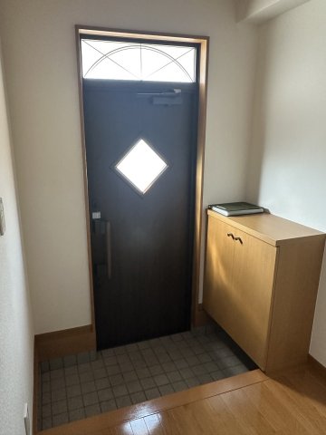 OMメゾン蔵子Aの玄関写真