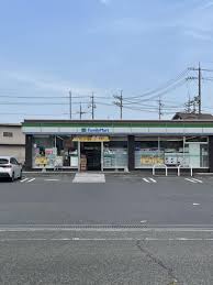 コンビニ　ファミリーマート玉島八島店（コンビニ）まで1037m