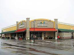 スーパー　ニシナフードバスケット南輝店（スーパー）まで446m