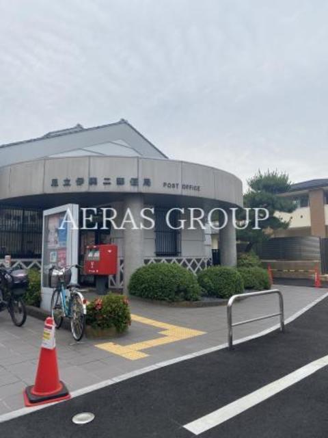 郵便局　足立伊興二郵便局（郵便局）まで569m