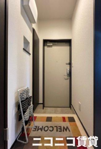 玄関　モデルルームの写真のため、現状を優先致します。