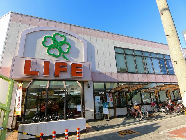 スーパー　ライフ十三東店（スーパー）まで584m