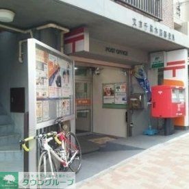 郵便局　文京千駄木四郵便局（郵便局）まで338m