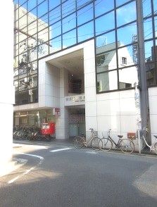 郵便局　西日暮里駅前郵便局（郵便局）まで449m