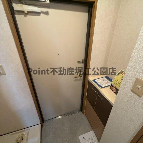 地下鉄長堀鶴見緑地線 西長堀駅 徒歩4分 9階建 築24年の玄関写真