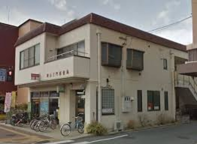 【岡山市北区三門中町のアパートの郵便局】