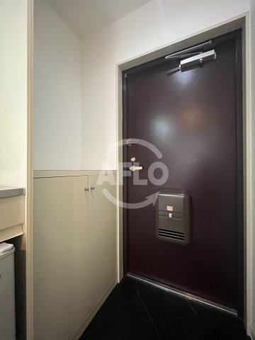 玄関　リアライズ西淡路　玄関