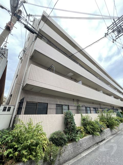 【大阪市大正区三軒家西のマンションの建物外観】