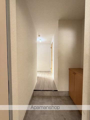 マキシム仁井令の玄関写真
