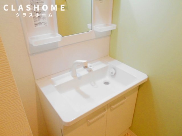 洗面設備　同物件の別部屋になります。