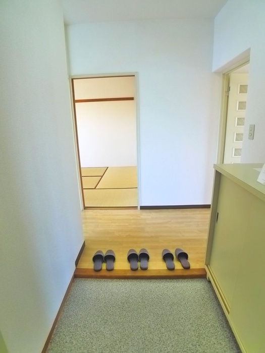 須賀第10マンションの玄関写真