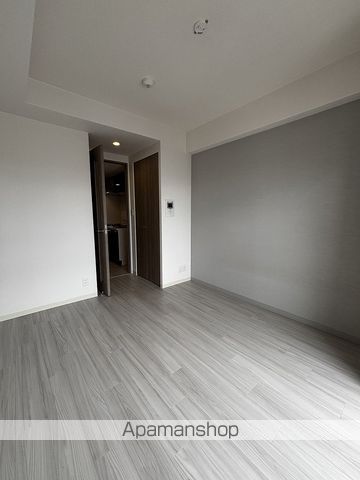 地下鉄堺筋線 天神橋筋六丁目駅 徒歩7分 10階建 築6年の居間写真