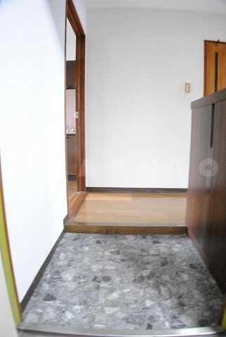 こすもらいふ千里の玄関写真