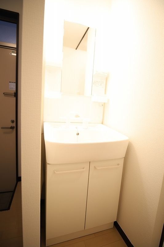 洗面設備　現状優先とし写真は参照とする。