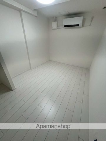 都営三田線 白金高輪駅 徒歩9分 5階建 築2年の居間写真