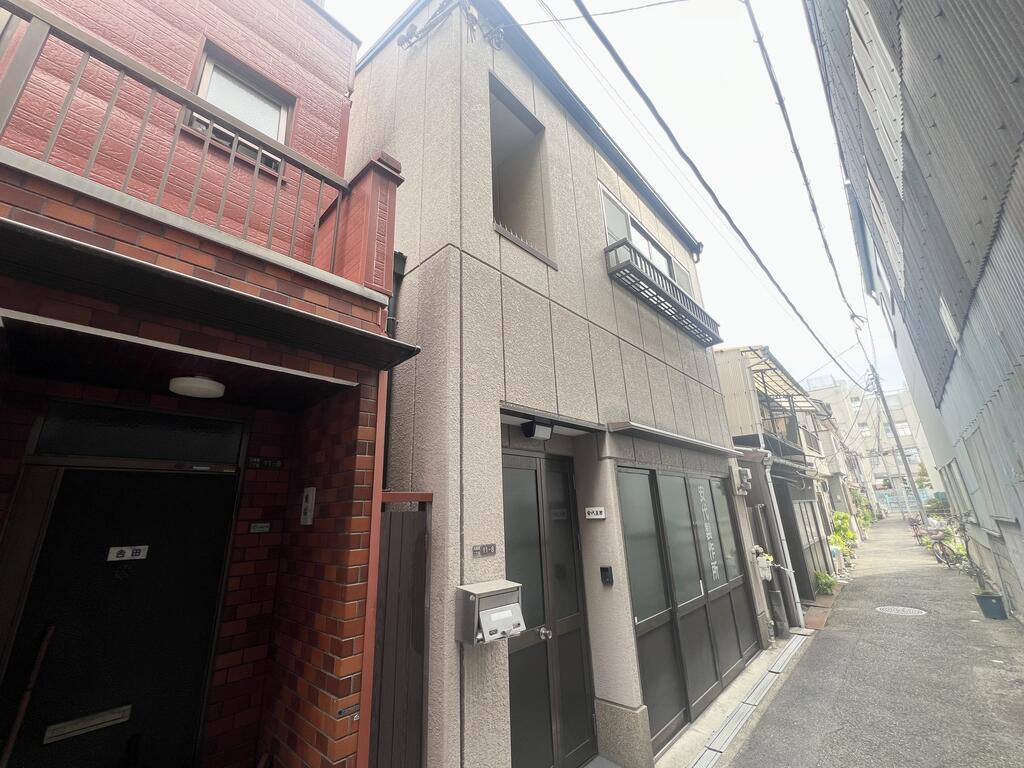 西区九条南2丁目作業所兼住居の建物外観