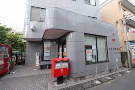 郵便局　稲田堤郵便局（郵便局）まで424m