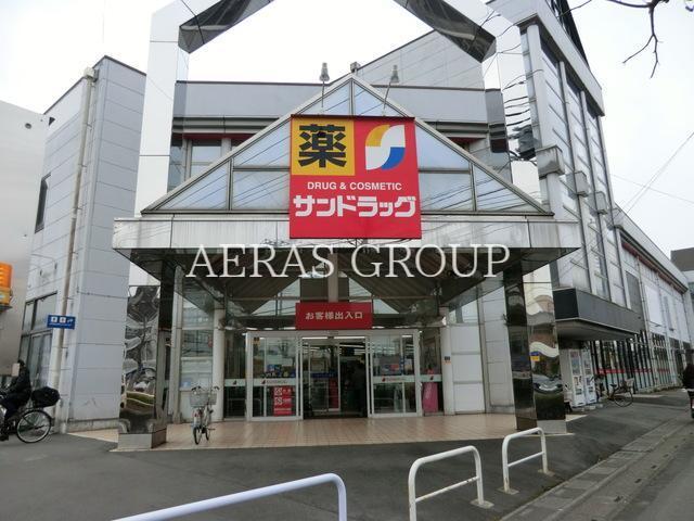 ドラックストア　サンドラッグ春日部ユリノキ通り店（ドラッグストア）まで415m