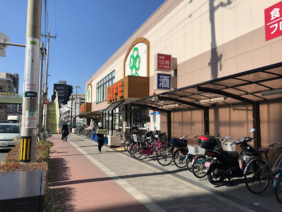 スーパー　ライフ十三東店（スーパー）まで447m