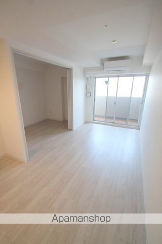アドバンス上町台シュタットの居間写真