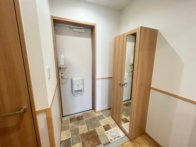 プレジール英賀保の玄関写真
